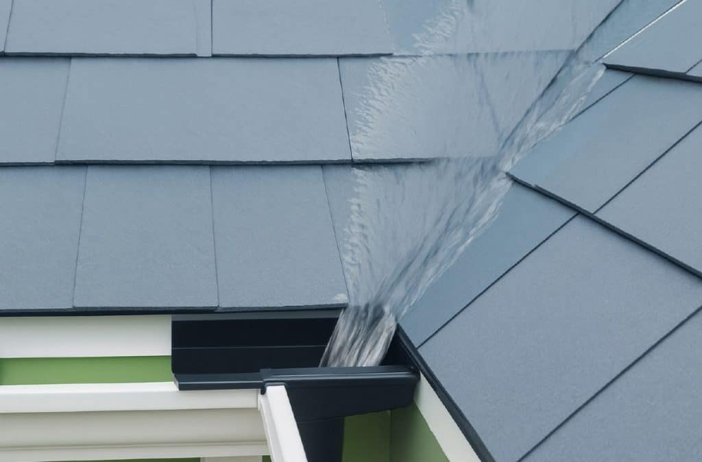 Water on roof flowing into an installed Valley Kicker